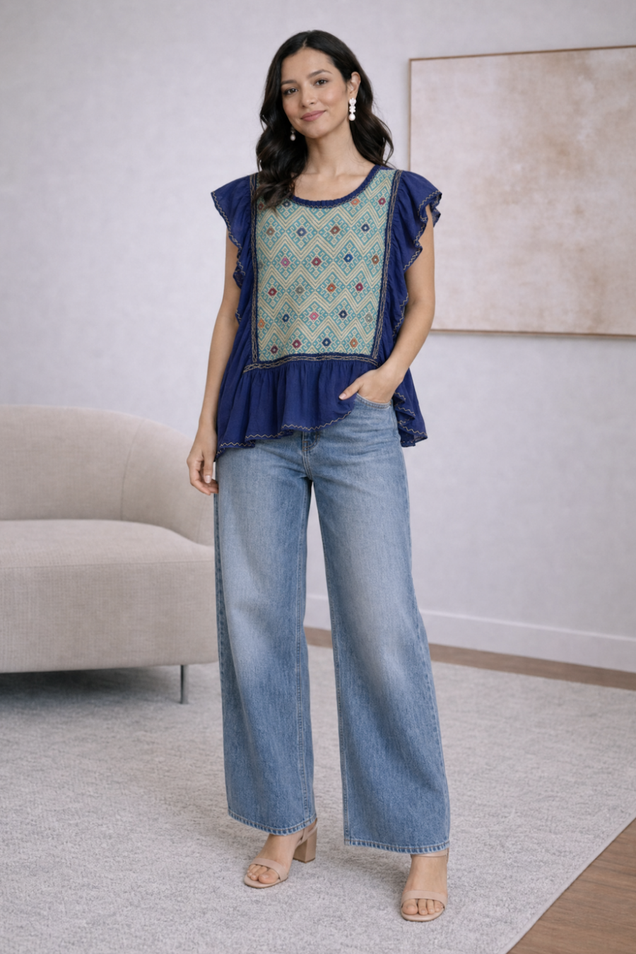 Folk-inspired embroidered peplum blouse